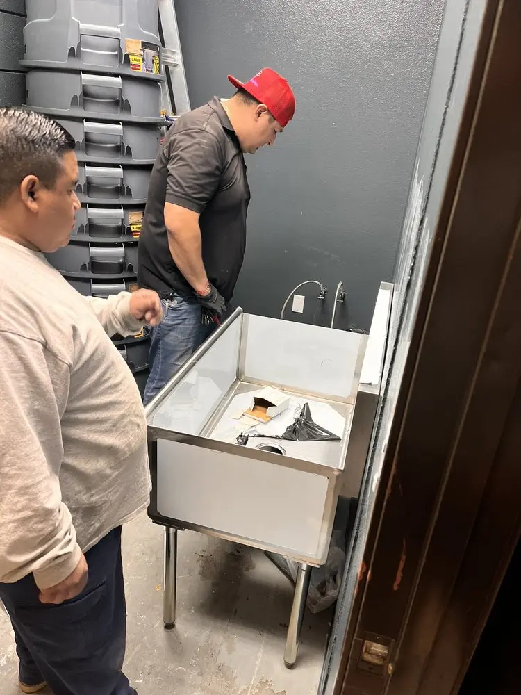 Commercial plumbing and sink installation in Clovis